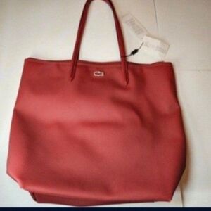 Red Lacoste Tote Bag with Spacious Interior and Classic Design